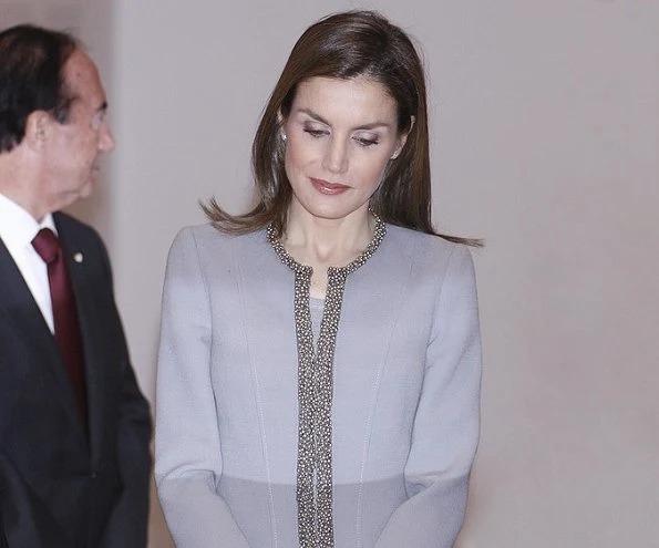 Queen Letizia wore Felipe Varela skirtsuit, Magrit Suede grey pumps, Magrit Clutch bag, diamond earrings
