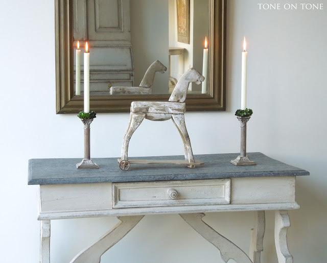 Beautiful Swedish antique wooden horse on table with mirror - Tone on Tone Antiques