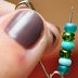 She Stacked Beads Onto A Safety Pin. What She Makes Is Something Every Girl NEEDS! SO CUTE!