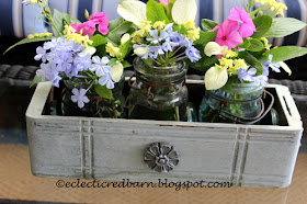 Painted sewing drawer wiht mason jars and flowers