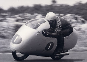 Ubbiali, racing a bike equipped with subsequently outlawed 'dustbin' fairing, in action at his peak in the 1950s