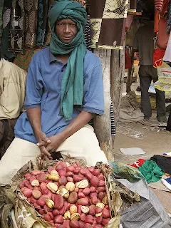 Selling Kola-nut in the market