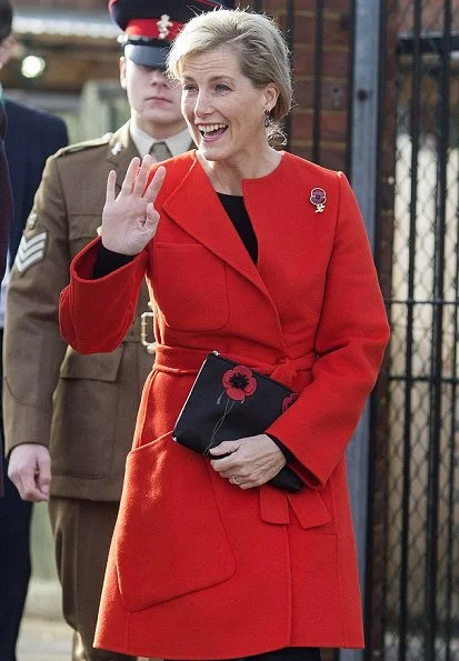 Countess Sophie wore Sportmax Maesa wool and angora blend coat, Lulu Guiness Poppy clutch, Smokey quartz earrings by Boho Betty