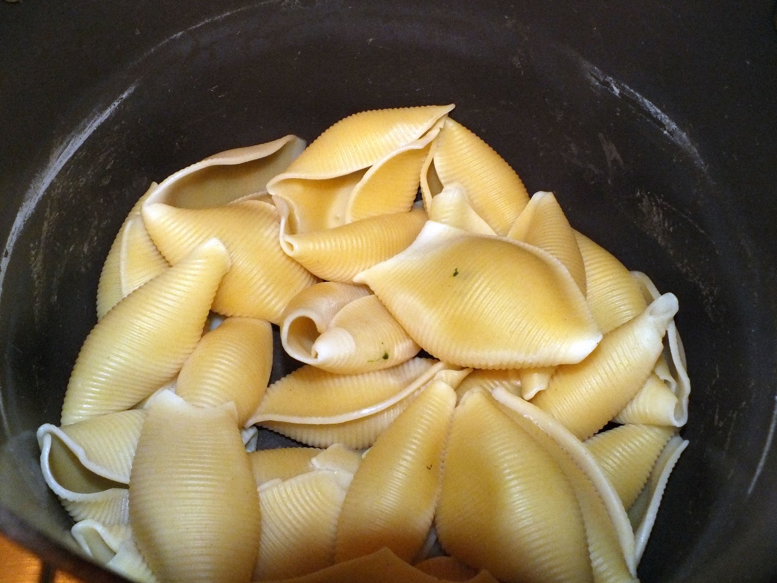 Making it yummy Baked Cheese Filled Pasta Shells