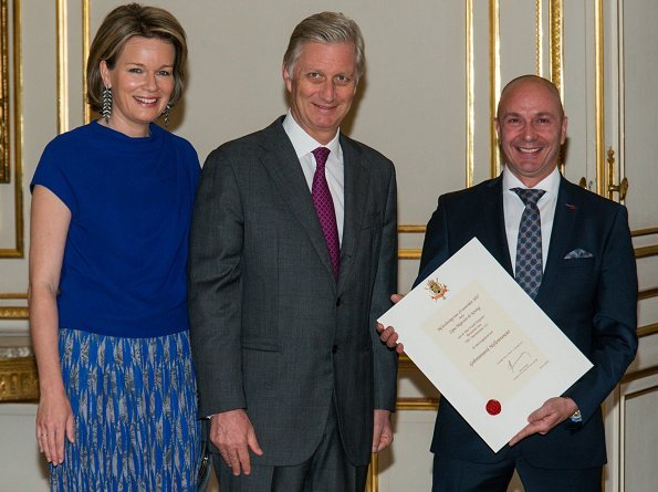 Queen Mathilde and King Philippe hosted a royal reception for the newly appointed suppliers. Natan top and skirt