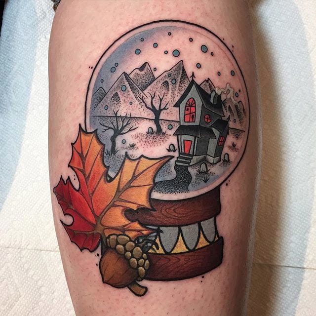 Keep Your Memories Encased In These Glinting Snow Globe Tattoos