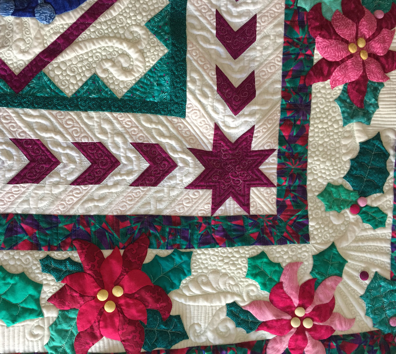 Innocent Until Proven Quilty quilting around a raised applique