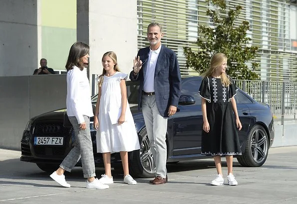 Queen Letizia wore Mango print trousers. Princess Leonor wore an embroidered dress by Mango. Sofia wore an embroidered dress by Mango