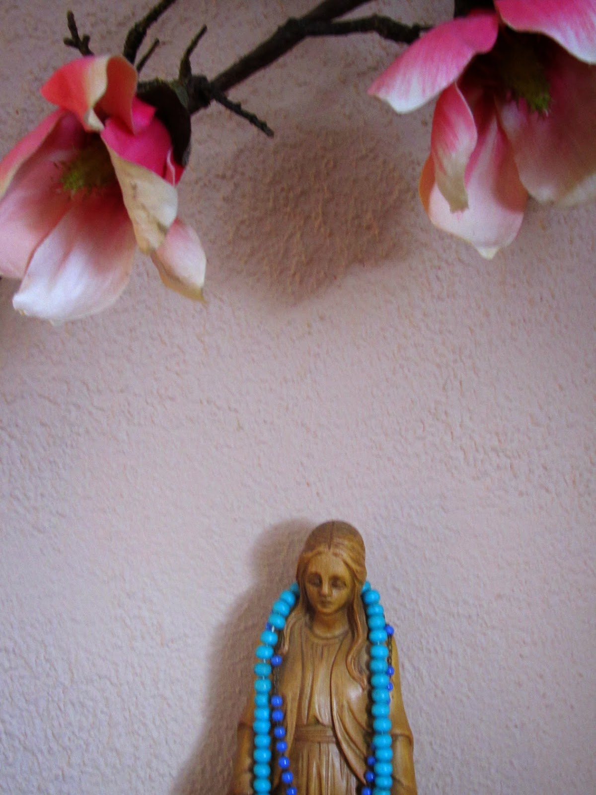 virgin Mary with flowers, rosary and mala