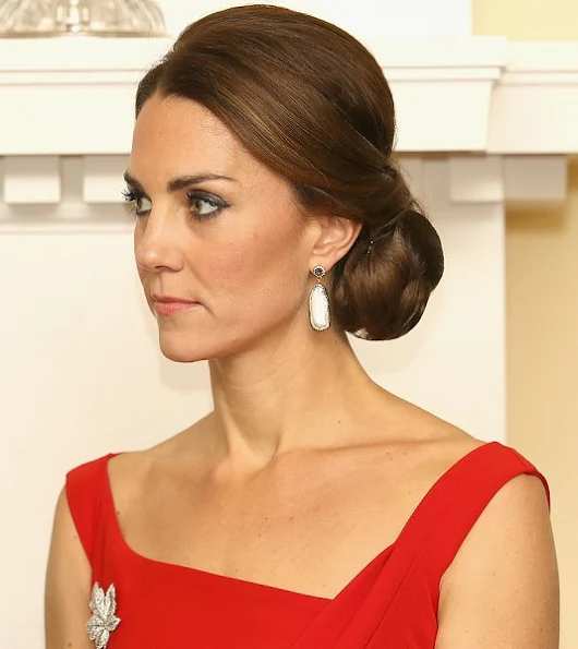 Kate Middleton wore Preen Finella Satin Midi Dres, Baroque Pearl Double Sided Earrings by Soru Jewellery,  Jenny Packham 'Casa' clutch, Gianvito Rossi pumps