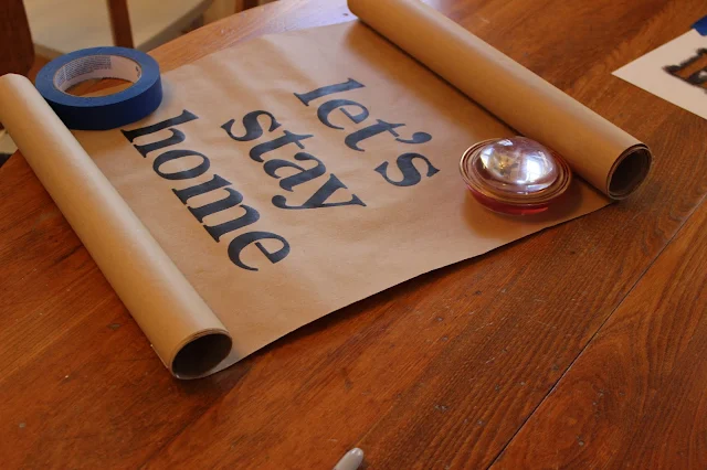 Easy & Inexpensive DIY Brown Craft Paper Stenciled Scroll Sign #stencil #kraftpaper #sign #scrollsign #DIY