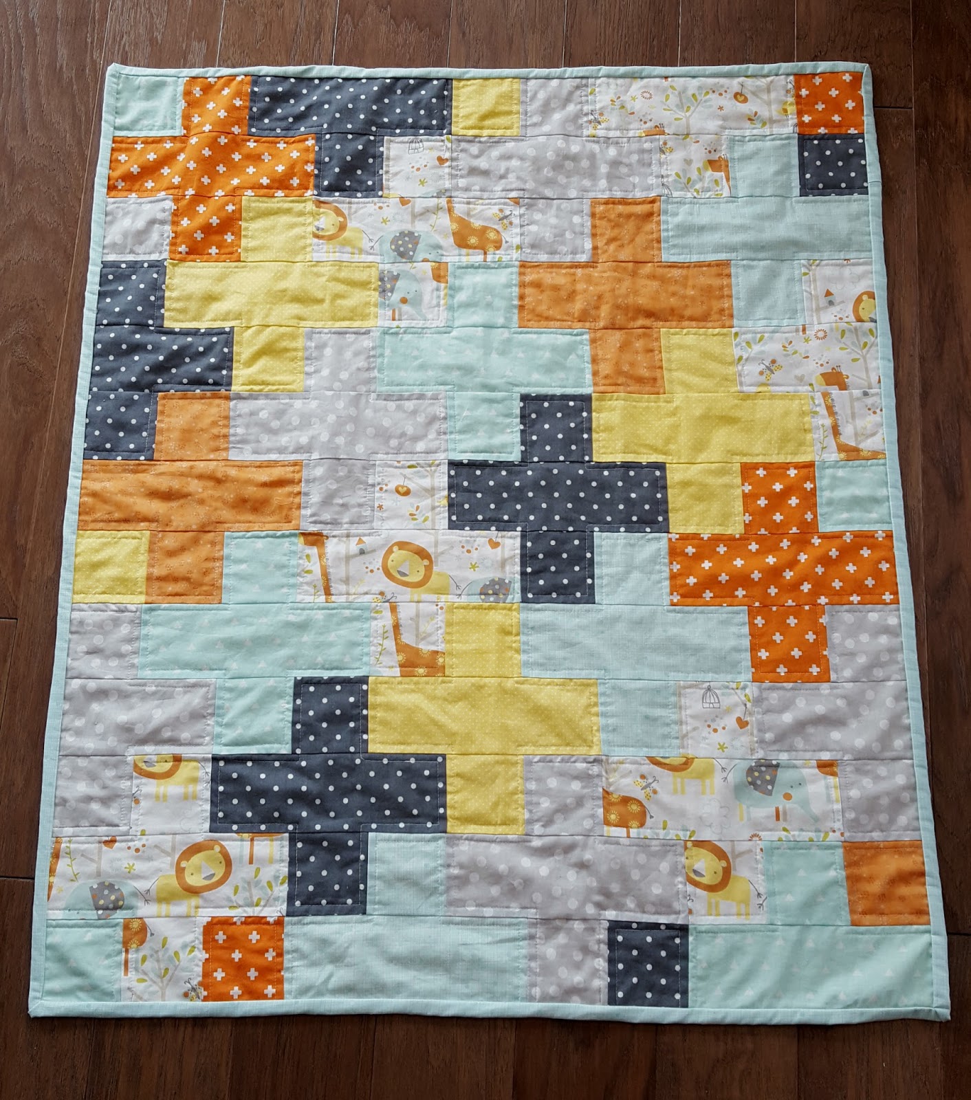The Domestic Engineer Colorful Cross Baby Quilt An Easy