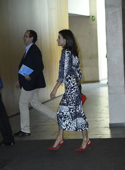 Queen Letizia wore a leopard-print silk blouse and midi skirt by Victoria Beckham. Crown Princess Leonor, Carolina Herrera