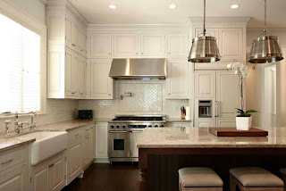 Light Filled Kitchen With White Countertops