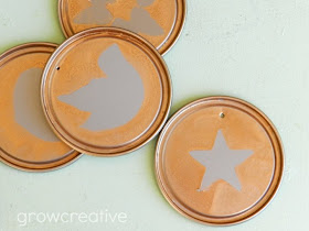 Recycled Christmas Craft- make ornaments from metal juice lids, paper, and spray paint: Grow Creative