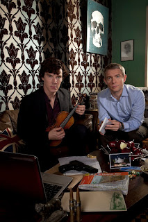 Benedict Cumberbatch and Martin Freeman as Sherlock Holmes and John Watson