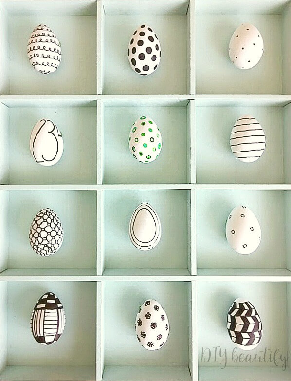 graphic Sharpie eggs in cabinet