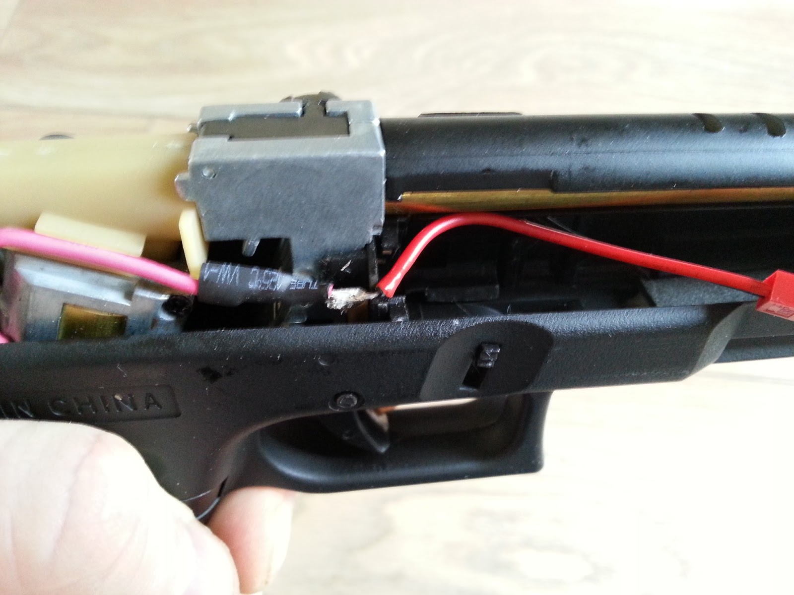 The Crapworks Airsoft Glock 18C NiMh to LiPo permanent hybrid conversion.