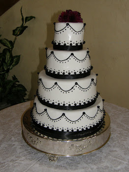 4-tier round fondant with black accents