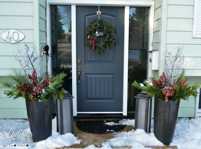How to make Festive Outdoor Lighted Christmas Planters to flank the front door that don't require watering with artificial greens for DIY holiday decor.