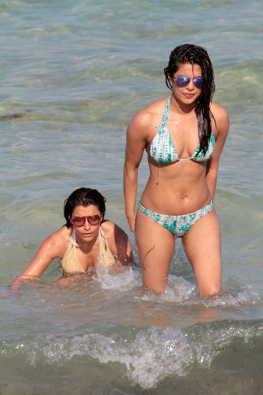 Priyanka Chopra Showcases Her Sexy Body in a Two Piece Bikini  As She Takes a Splash in Miami Beach