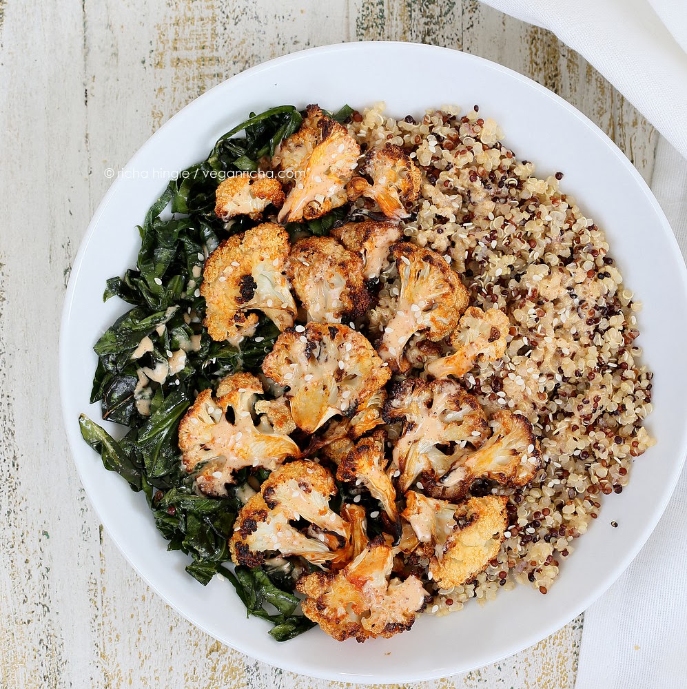 This delicious Quinoa Cauliflower bowl is filled with grains, lightly cooked greens & Sriracha Sauce, so it's healthy AND delicious! Vegan, soy-free