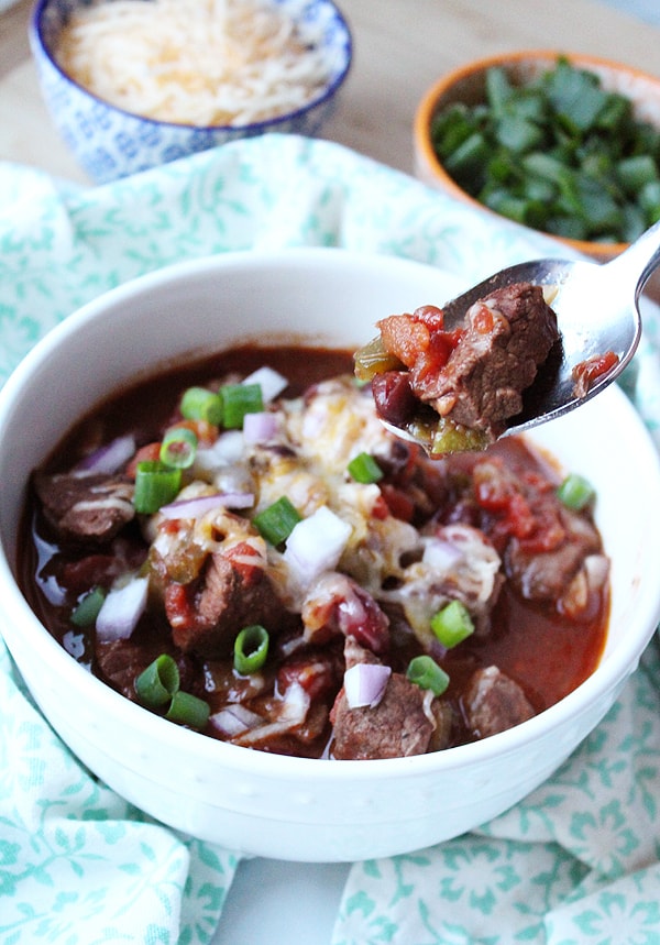 This healthy instant pot chili recipe is easy to make. Get a hearty beef chili by using stew meat instead of ground beef for the best taste and texture. This recipe is naturally gluten free and only has 7 weight watchers point in one hearty serving.  #creativegreenliving #creativegreenkitchen #chili #chilirecipes #instantpot #chilicookoff #chiliconcarne #glutenfree #freefrombad #wildharvest
