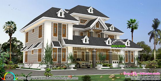 Colonial style dormer window home in Kerala