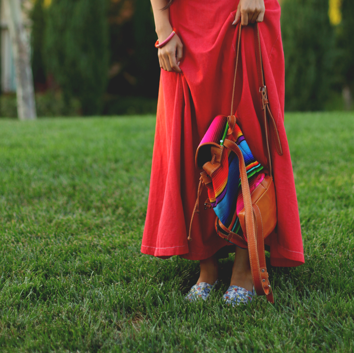 Stephanie Liu of Honey & Silk wearing Armani denim dress (thrifted), tropical Soludos shoes, and Stela 9 hacienda backpack