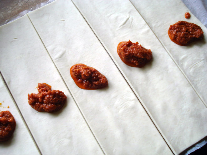 coat each strip with red pesto