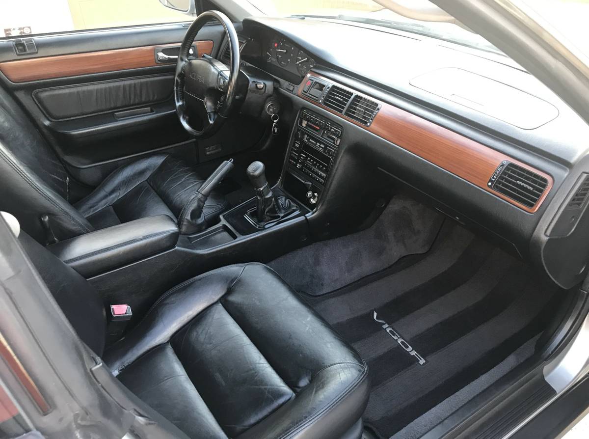The owner's manual and two factory keys convey with the sale.