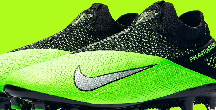 green and black nike boots