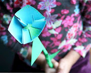 . amazing origami man, where he explains how to fold excisting flowers. (bpaper flowers )