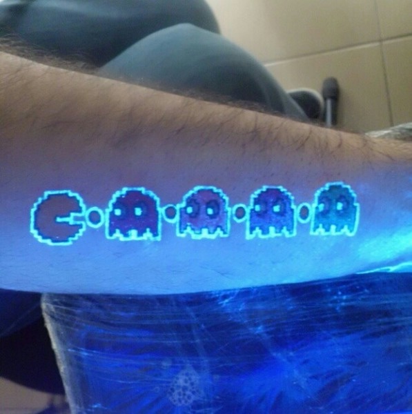 2. Pac-man and ghosts. - 30 Glow-In-The-Dark Tattoos That’ll Make You Turn Out The Lights. 2. Pac-man and ghosts. - 30 Glow-In-The-Dark Tattoos That’ll Make You Turn Out The Lights.