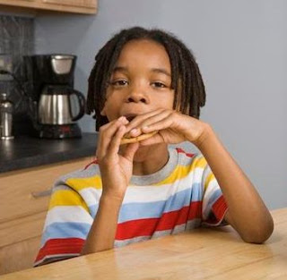 African American Kid Eating