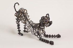 08-Chica-Junior-Nirit-Levav-Recycled-Bicycle-Parts-used-for-Unchained-Dog-Sculptures-www-designstack-co