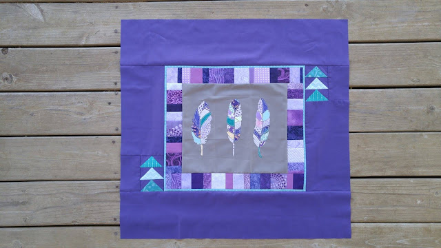 Aqua and purple feather round robin quilt