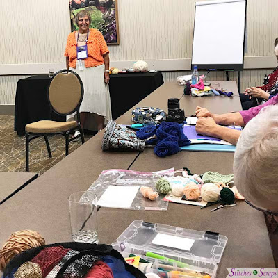 Pauline Turner teaching a class on cutting crochet
