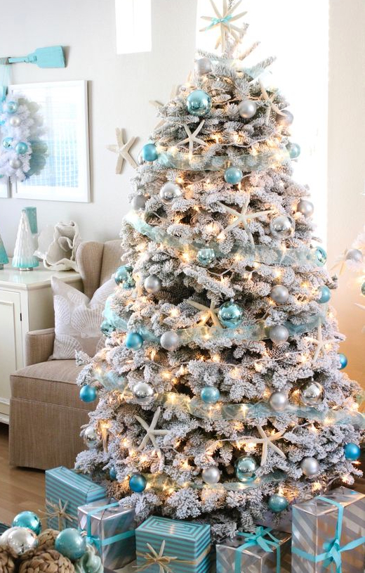 Snowy Flocked Coastal Christmas Tree Ideas with Blue Ornaments