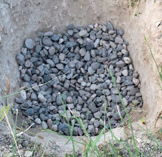 Stones to aid drainage for the olive tree Stones to aid drainage for the olive tree