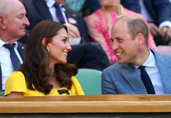 Kate Middleton wore Dolce & Gabbana Cap Sleeved Cady Midi Dress and gold earrings. Catherine, Duchess of Cambridge and Prince William