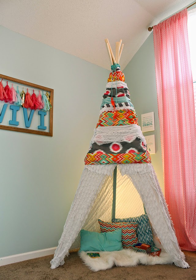 How to make a cute and easy DIY play teepee – perfect for a kid's bedroom, playroom, or reading nook! Ours is still a hit 6 years later!