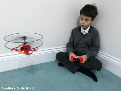 Child playing with the Little Tikes My First Drone toy