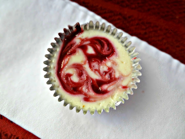 Mini Raspberry Swirl Cheesecakes