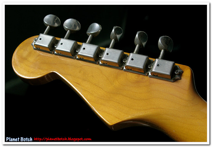 Rear of Strat headstock showing tuners.