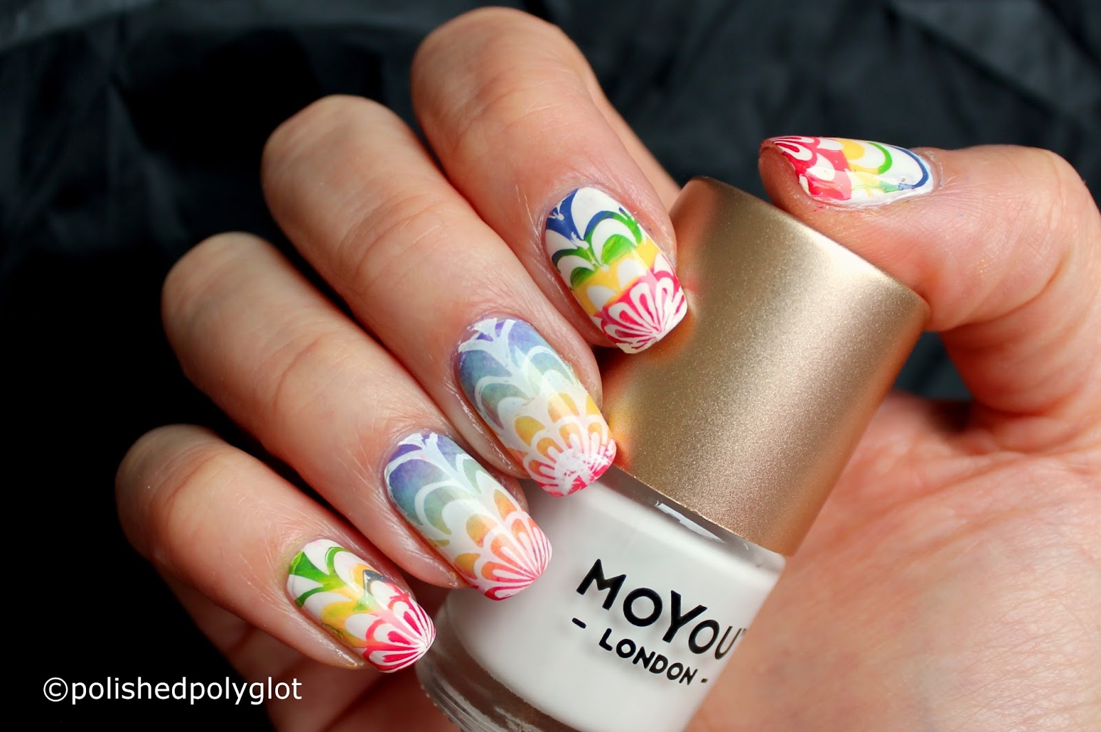 4. Step-by-Step Rainbow Water Marble Nail Art - wide 3