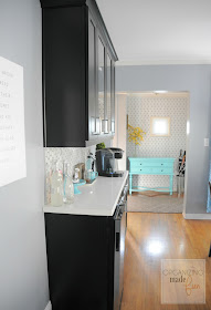 View from dining area of entry with turquoise entry table :: OrganizingMadeFun.com