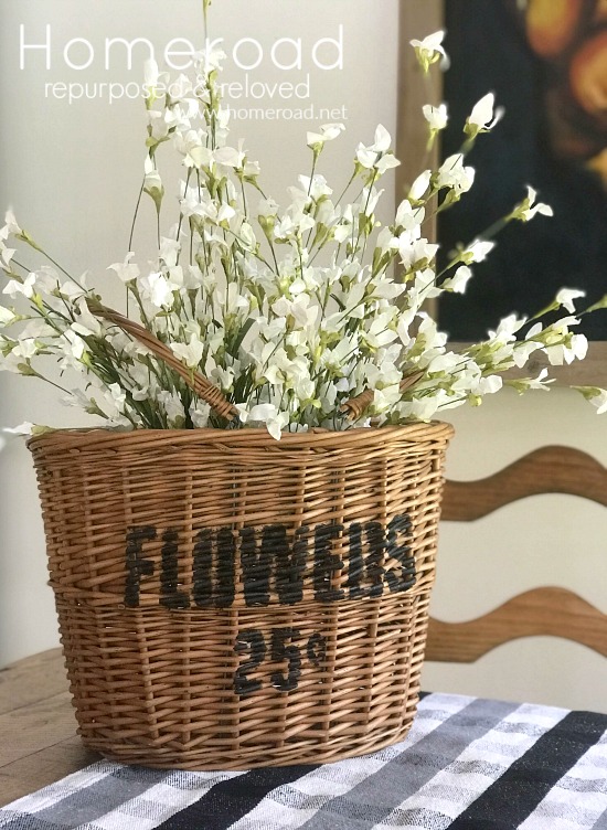 Thrift store basket full of flower with DIY stencil