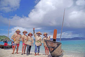 sabani boat, team, uniforms, beach, blue skies