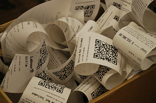 Image: Close-up of the receipts spooling out, by Ben Osteen on Flickr